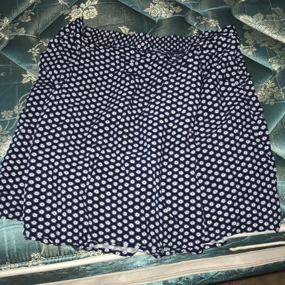 Dark blue skirt decorated with white flowers